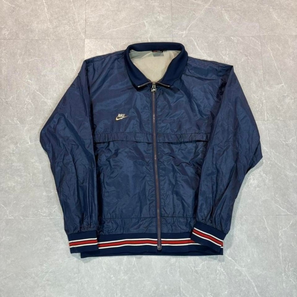 1980's Navy Nike windbreaker jacket with red and white stripes